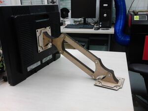 thumb Prototype monitor arm, laser cut from offcuts of plywood